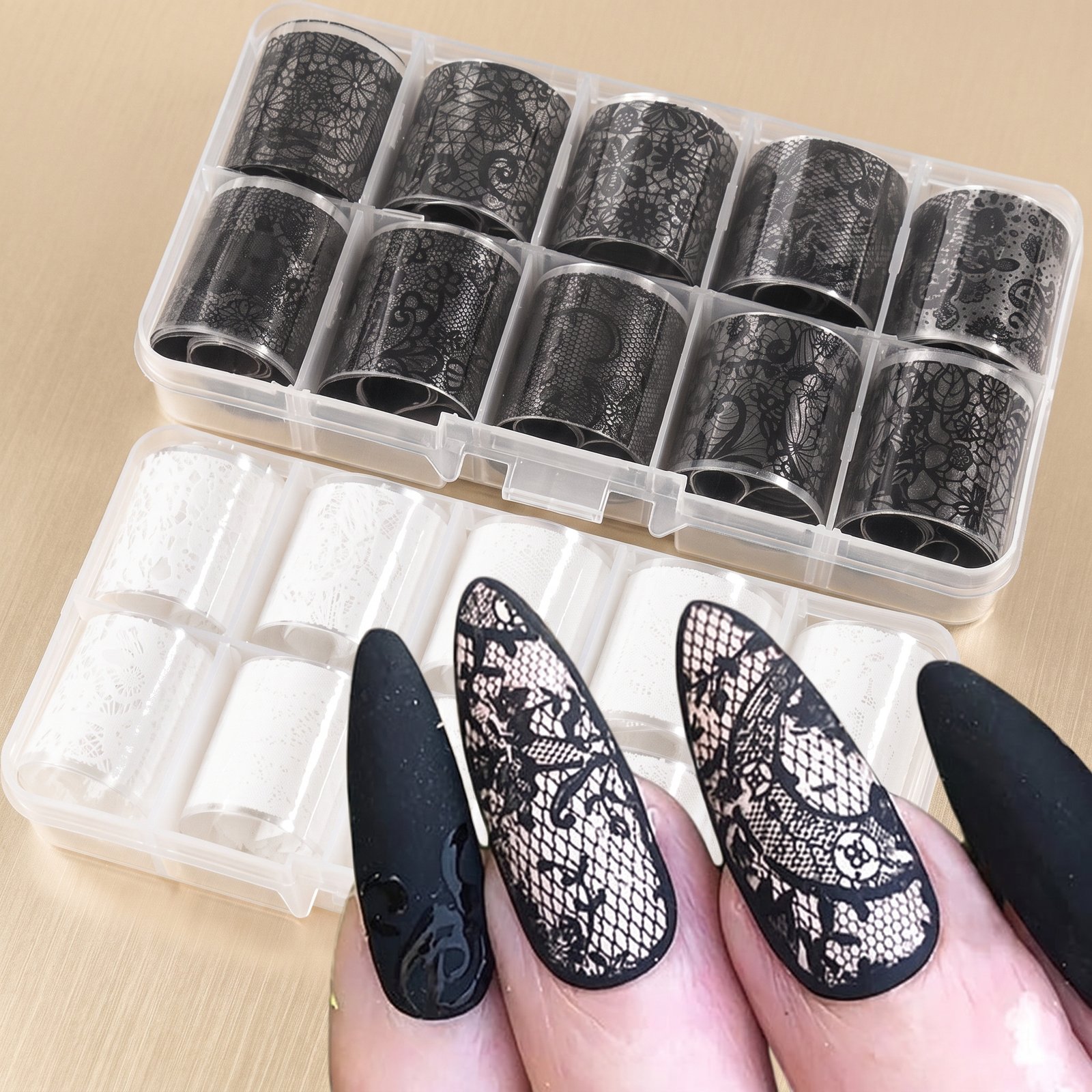 Black and white lace foil trays with black and lace manicure examples, on a gold background
